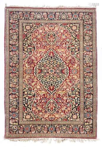 An antique Isfahan wool rug