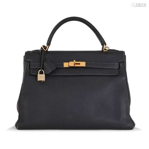 HERMÈS, Sac Kelly 32 cm retourné en veau togo bleu indigo, d...