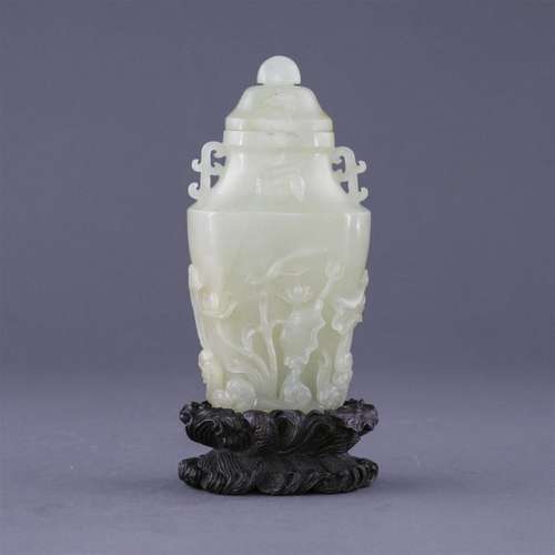 CHINESE JADE LIDDED VASE IN LOTUS RELIEF