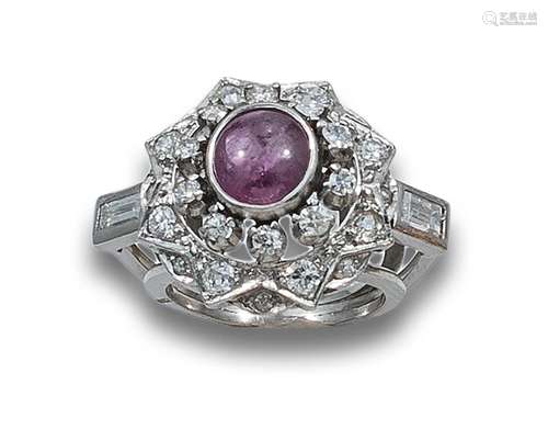 BOMBÉ RING, 70s, WITH CABOCHON CENTER OF RUBY, DIAMONDS AND ...