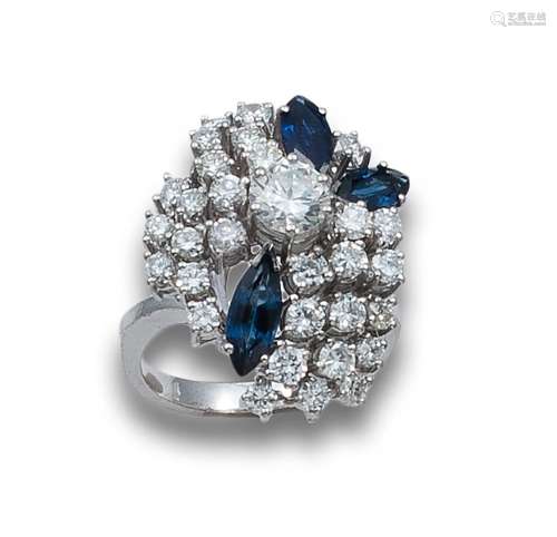 HIGH RING OF DIAMONDS, SAPPHIRES AND PLATINUM