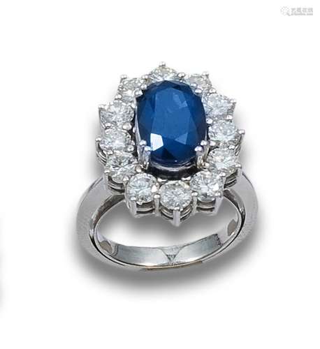 CENTRAL SAPPHIRE ROSETTE RING, DIAMONDS EDGE, IN WHITE GOLD