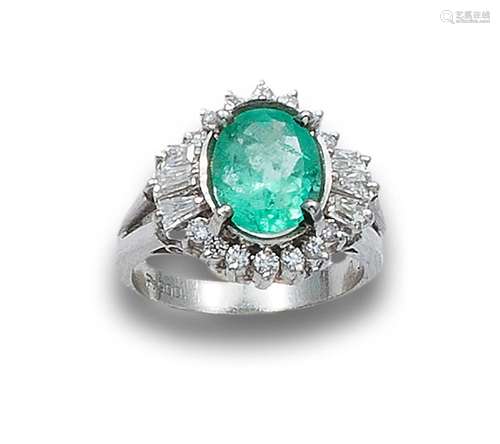 PLATINUM RING WITH EMERALD AND DIAMONDS