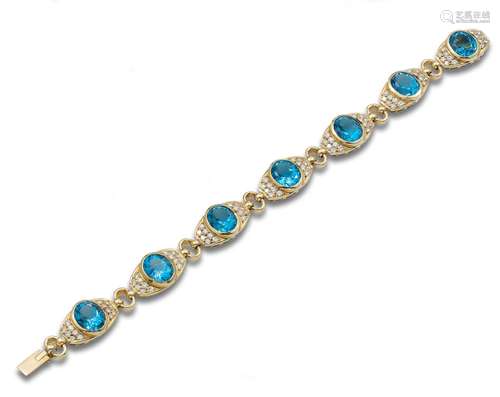 BLUE TOPAZ, DIAMONDS AND YELLOW GOLD BRACELET