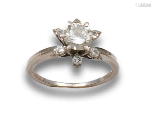 DIAMONDS AND WHITE GOLD FLOWER SOLITAIRE