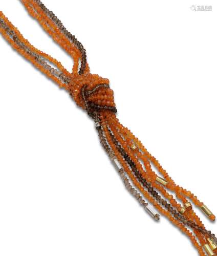 TIE-TYPE NECKLACE MADE OF THREE STRANDS OF SMOKED QUARTZ AND...