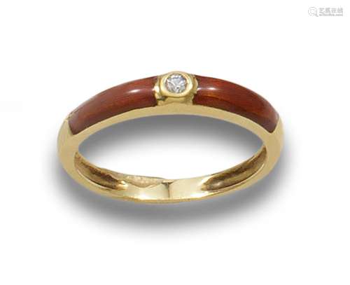 WEDDING RING IN YELLOW GOLD WITH CENTRAL DIAMOND IN CHATON A...