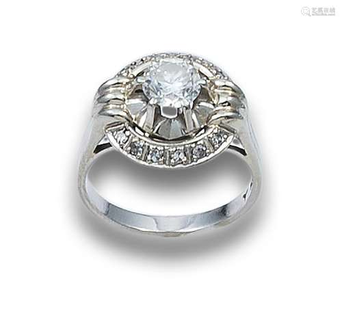 RING IN WHITE GOLD WITH DIAMOND EDGED WITH ZIRCONS