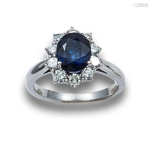 SAPPHIRE, DIAMONDS AND WHITE GOLD ROSETTE RING