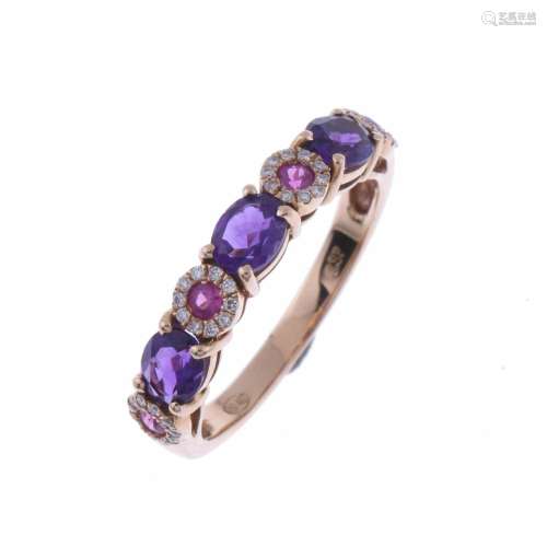 ETERNITY RING WITH AMETHYSTS AND RUBIES.