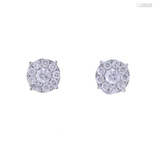 BUTTON EARRINGS WITH DIAMONDS.