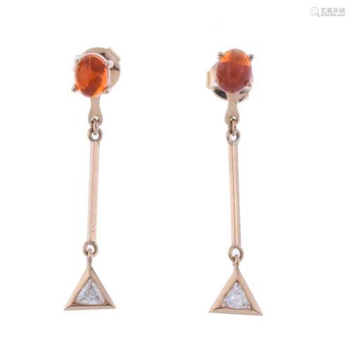 TRANSFORMABLE EARRINGS WITH DIAMONDS AND FIRE OPAL.