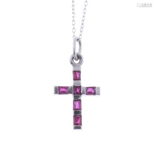 CROSS PENDANT WITH RUBIES.