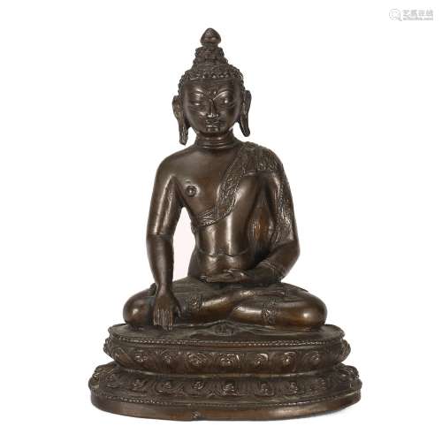 A BRONZE FIGURE OF SEATED SHAKYAMUNI