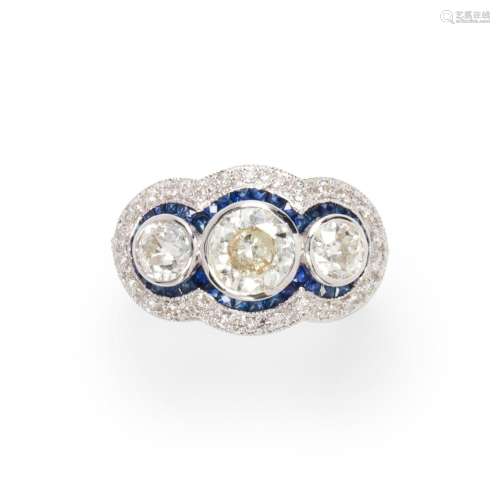 A diamond, sapphire and platinum ring