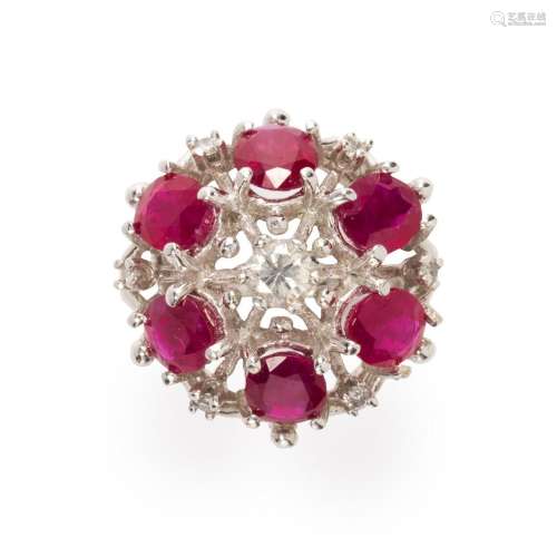 A Burma ruby, diamond and fourteen karat white gold ring