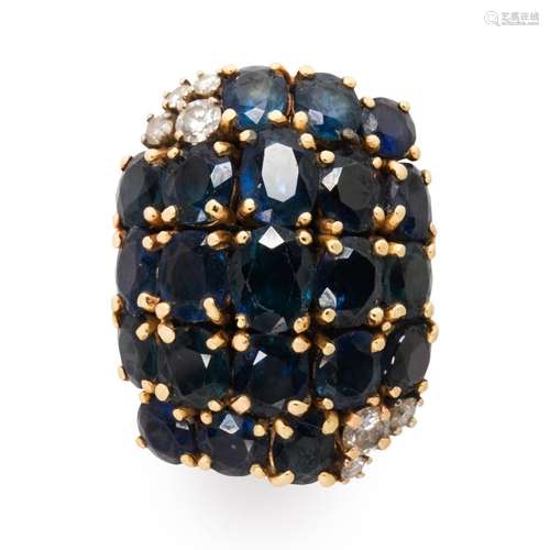 A sapphire, diamond and fourteen karat gold ring