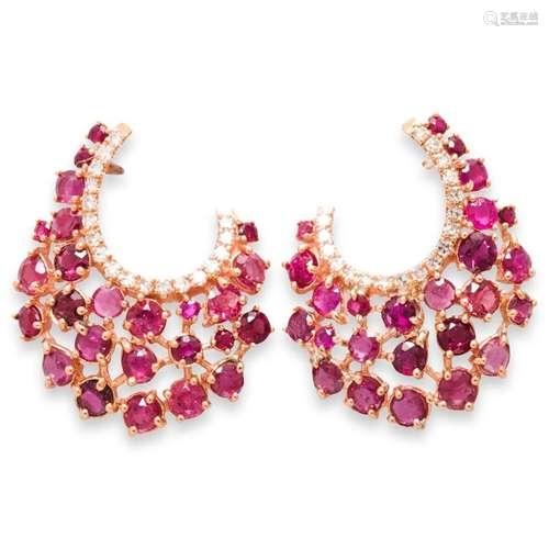 A pair of ruby, diamond and eighteen karat rose gold earring...