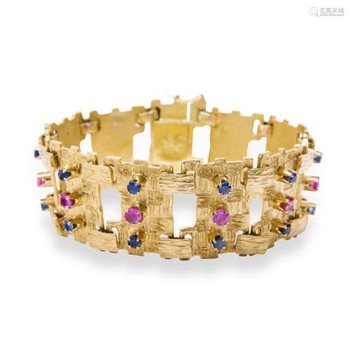 A gemstone and eighteen karat gold bracelet