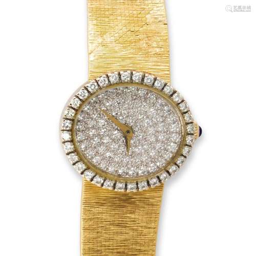 A diamond and eighteen karat gold watch, Baume Mercier