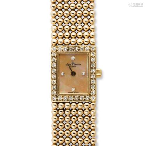 A diamond and fourteen karat gold watch bracelet, Baume &...