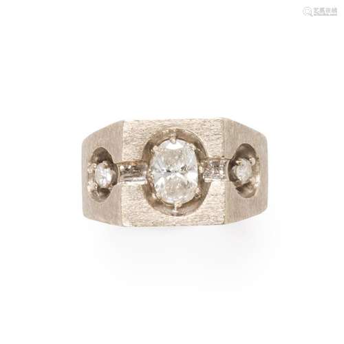 A diamond and fourteen karat white gold ring