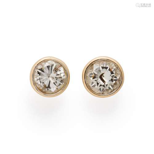 A pair of diamond and fourteen karat gold earrings