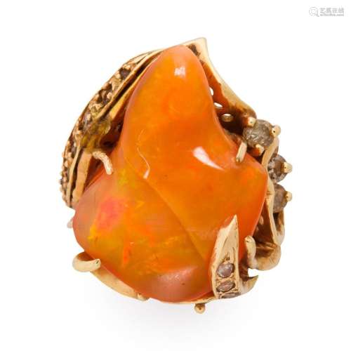A fire opal, diamond and fourteen karat gold ring
