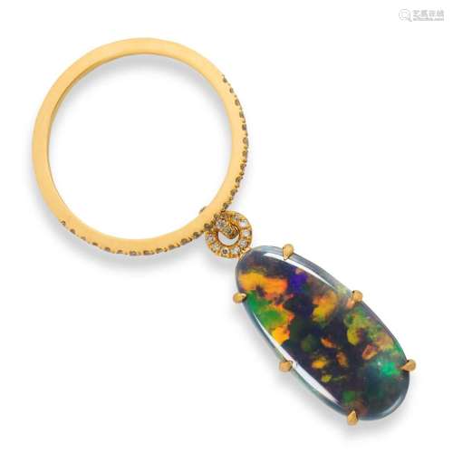 A black opal, diamond and eighteen karat gold charm