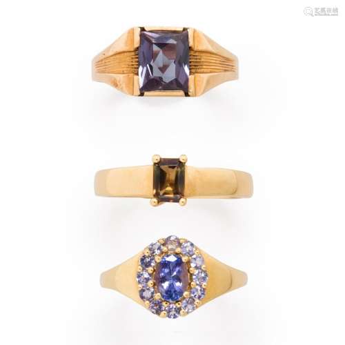 A group of gemstone and fourteen karat gold rings