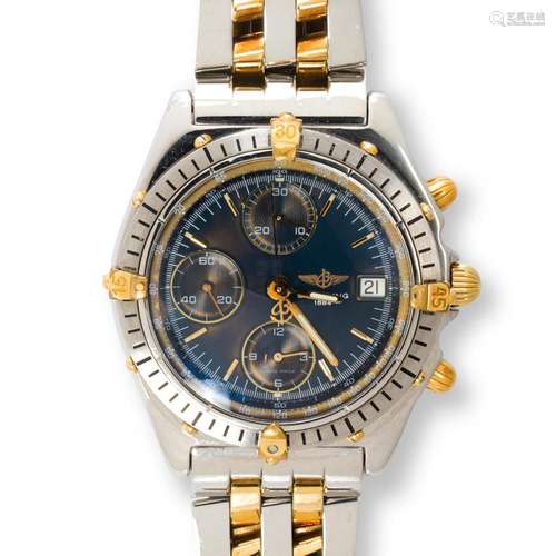 A stainless steel and eighteen karat gold two-tone wrist wat...