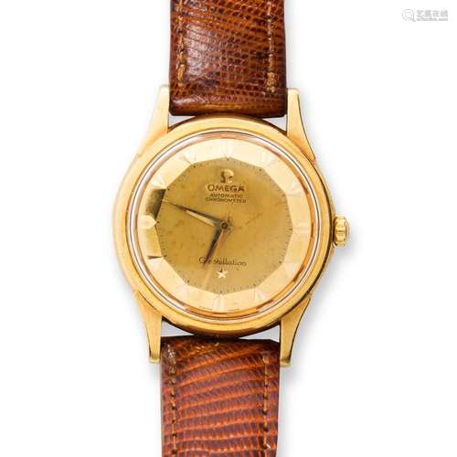 An eighteen karat gold wristwatch, Constelation Deluxe, Omeg...