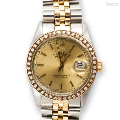 An eighteen karat gold and stainless steel two-tone wristwat...