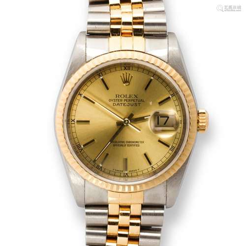 A diamond, eighteen karat gold and stainless steel wristwatc...