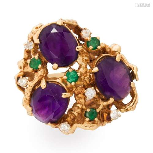 A gemstone and fourteen karat gold ring