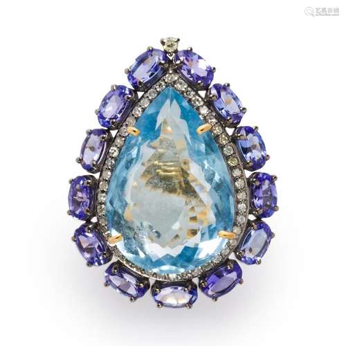 An aquamarine, tanzanite and diamond ring