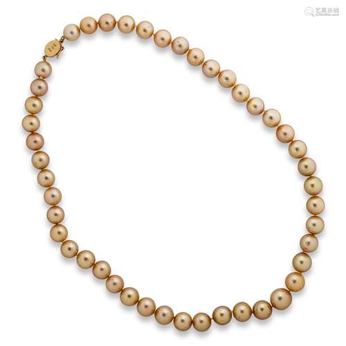 A golden pearl and fourteen karat gold necklace