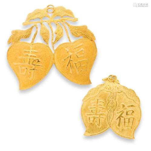 A group of high karat gold pendants