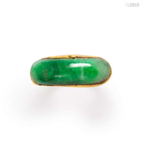 A jade and twenty-two karat gold ring