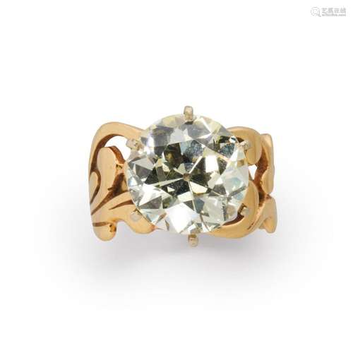 A diamond and fourteen karat gold ring