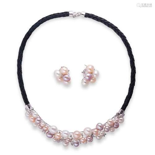 A pearl, diamond and fourteen karat gold necklace and earrin...