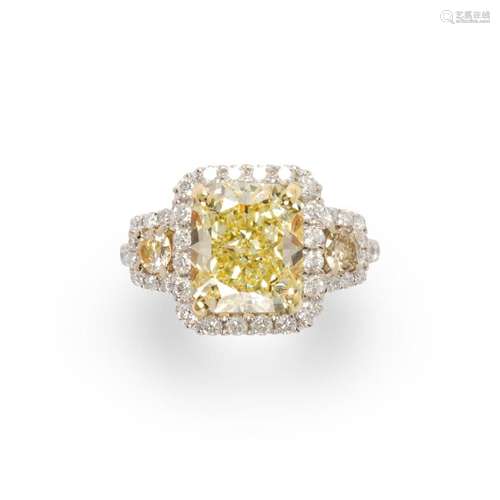 A Fancy Yellow diamond, diamond and eighteen karat white gol...