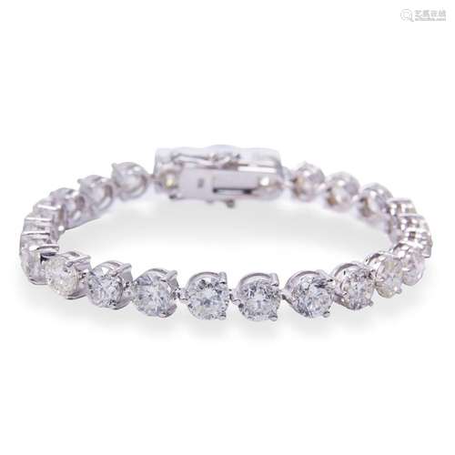 A diamond and eighteen karat gold bracelet