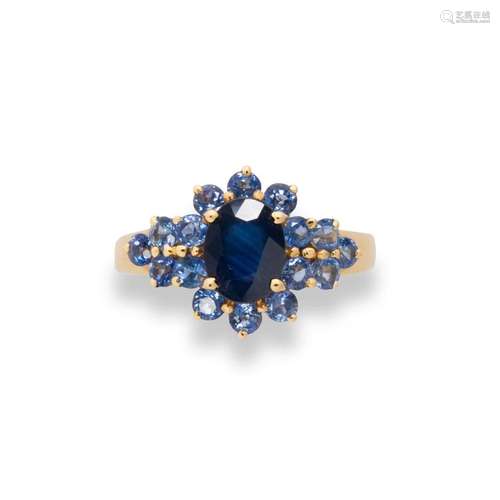 A sapphire and ten karat gold ring