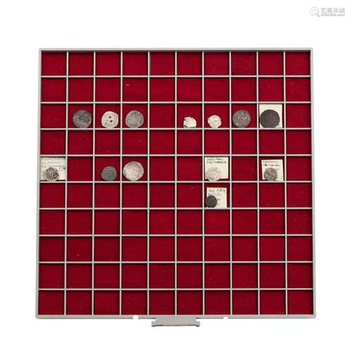 Tableau with historical coins from around the world-