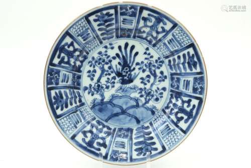 antique Chinese plate in porcelain with a blue-whi…