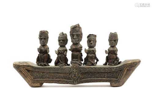 Sulawesi wooden spirit or tomb boat with five figu…