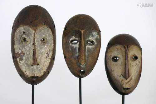 three African Congolese `Lega` masks in wood with …