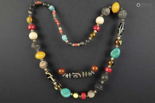 Himalayan necklace with beads in several materials…