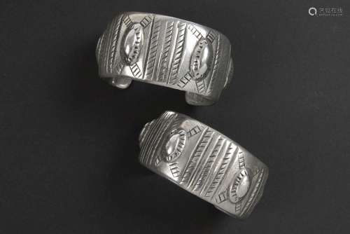 pair of Egyptian ethnic bangles in marked silver f…
